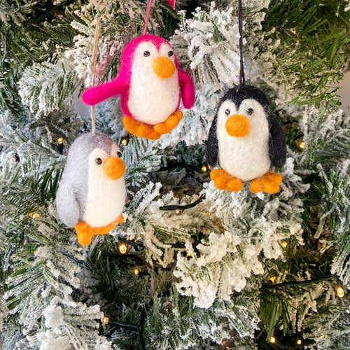 Three felt penguin christmas tree decorations
