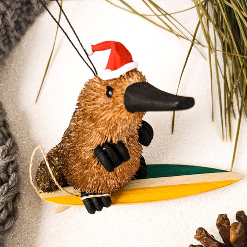 Surfing platypus christmas tree ornament